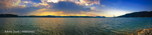 Panoramic image of a sunset over the Solina lake