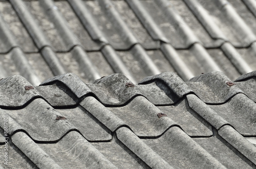 SELECTIVE FOCUS TO ZINC METAL ROOF TEXTURE BACKGROUND IN NATURE DAY LIGHT