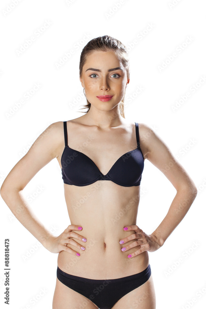 Portrait of sexy young woman in black underwear on white isolate Portrait of sexy young woman in black underwear on white isolate