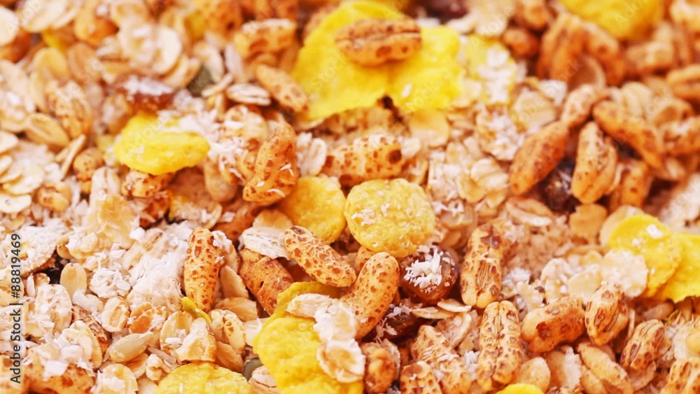 Muesli in bowl at rotating display - extreme close up; no people; HD 1080 Muesli in bowl at rotating display - extreme close up; no people; HD 1080