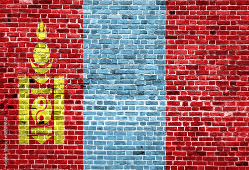 Flag of Mongolia painted on brick wall, background texture