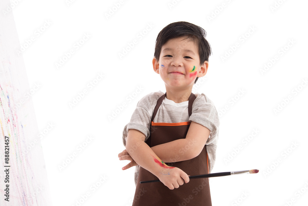 Cute little asian boy painting isolated Cute little asian boy painting isolated