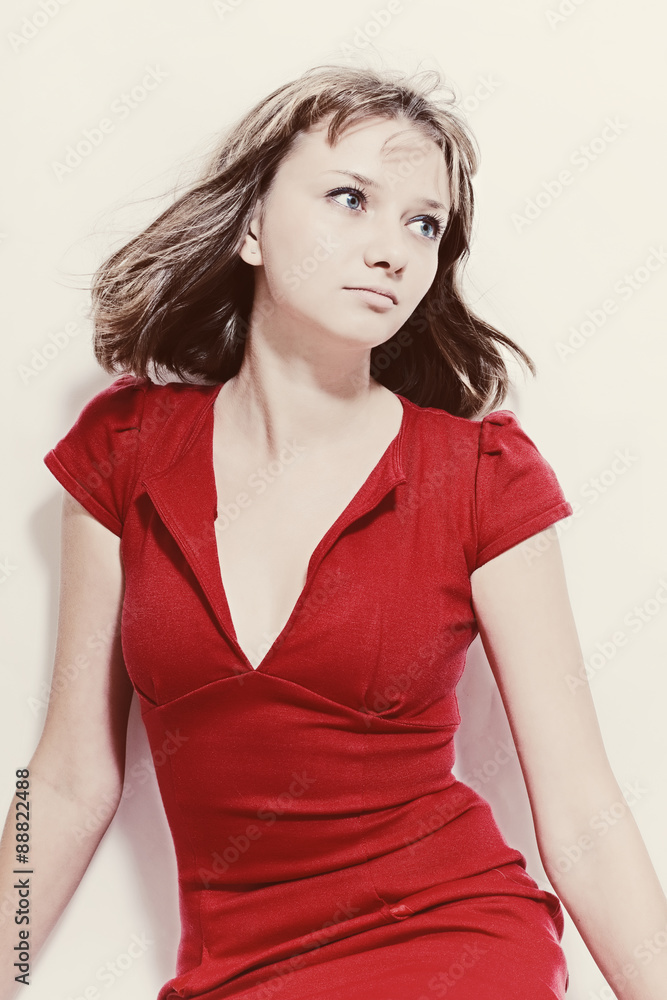 Beautiful young woman in a red dress Beautiful young woman in a red dress