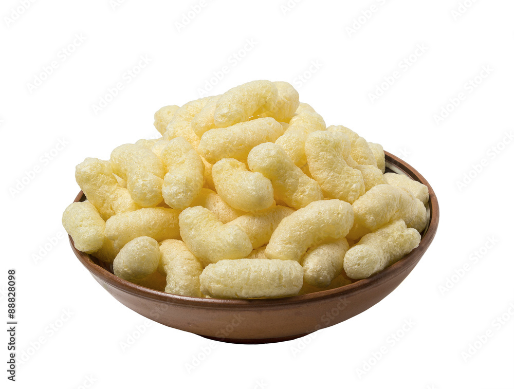 Crispy corn flakes on a plate. Isolated on white background Crispy corn flakes on a plate. Isolated on white background