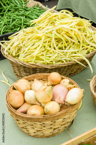 Baskets of onions and beans