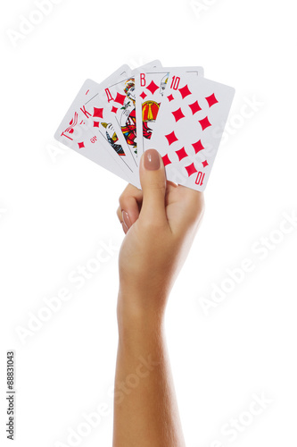 Playing cards in hand isolated on white background