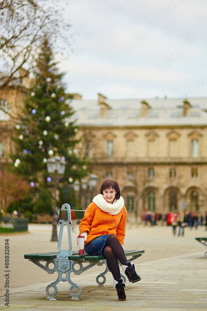 Happy young tourist in Paris on a winter day Happy young tourist in Paris on a winter day