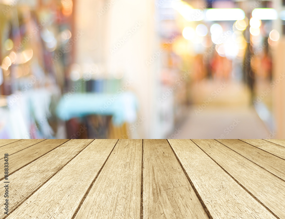 Perspective wood and blurred store with bokeh background Perspective wood and blurred store with bokeh background