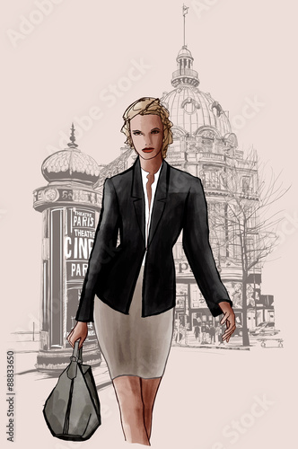 Woman walking at the "grand boulevard" in Paris