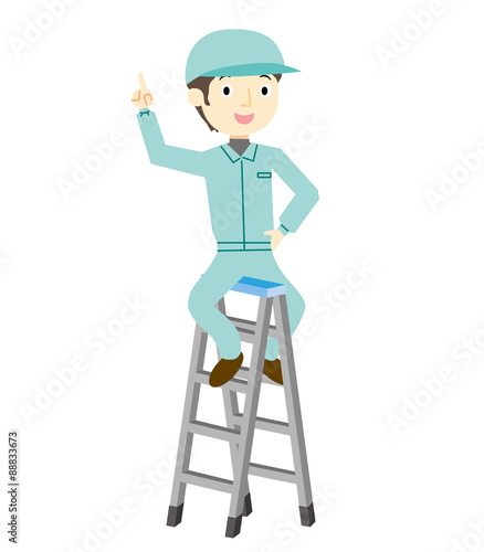 脚立に登る作業員の男性
