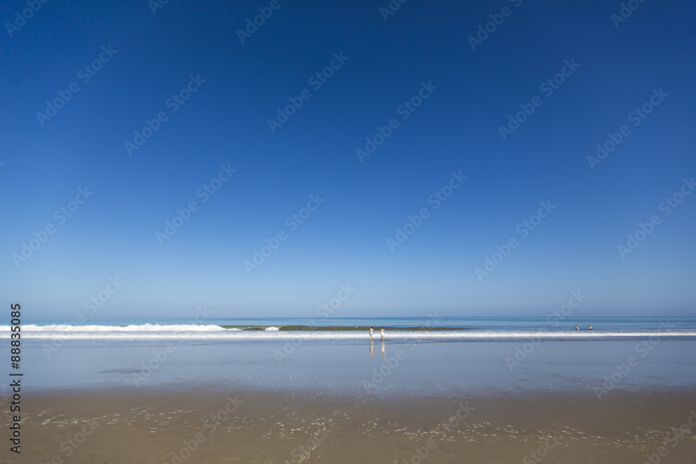 Empty beach in Mancora against a clear blue sky Empty beach in Mancora against a clear blue sky