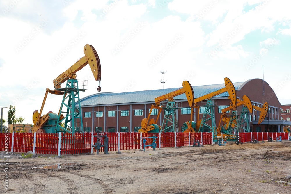 Golden yellow Oil pump of crude oilwell rig Golden yellow Oil pump of crude oilwell rig