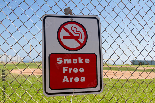 Red Smoke Free Area Sign at a Baseball Field by the Pacific Ocean