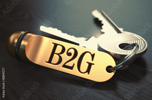 B2G Concept. Keys with Golden Keyring. photo