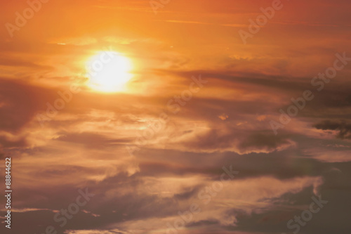 Sunset / sunrise with clouds, light rays and other atmospheric effect. Beautiful natural background.