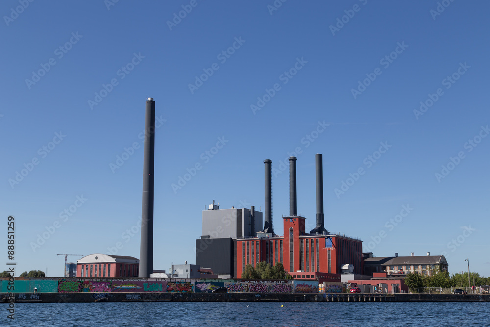 Obraz premium Copenhagen, Denmark - August 9, 2015: Photograph of the H. C. Ørsted Power Plant which main task is to supply district heat to Greater Copenhagen.