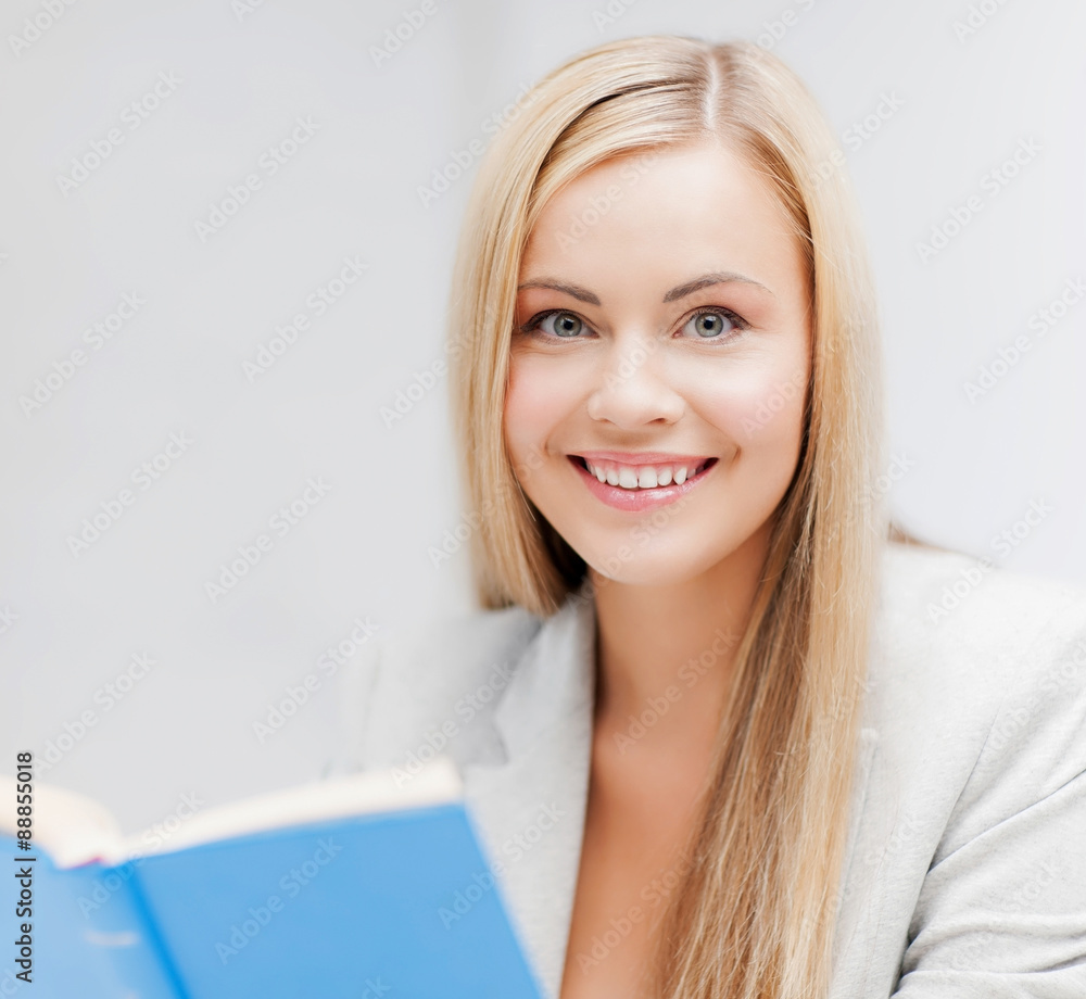 Plakat young woman reading book