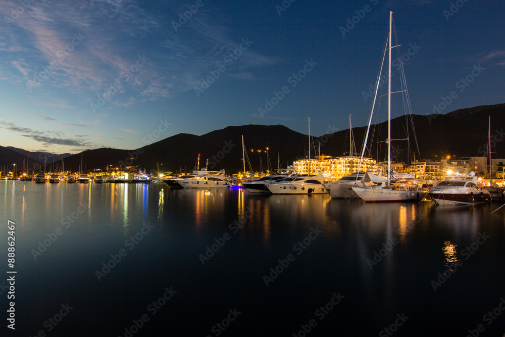 luxury yacht marina in evening