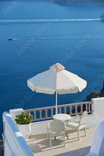 Two chairs with a sea view in Oia  Santorini island  Greece.