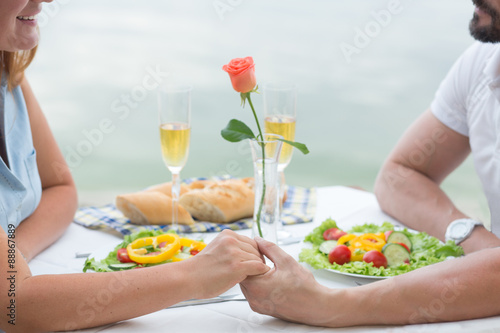 Couple holding hands