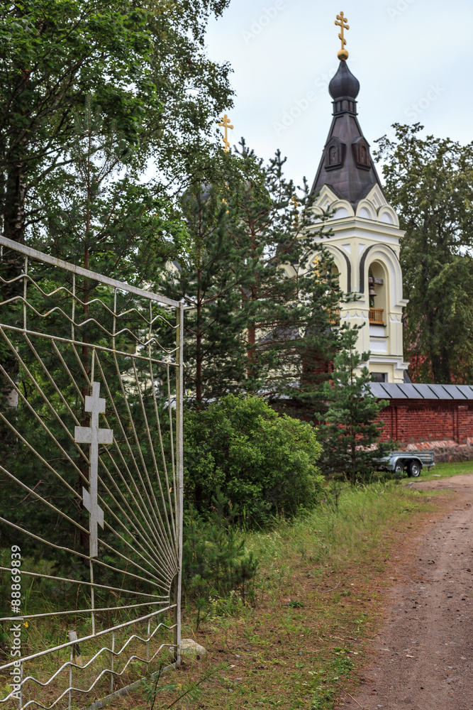 The Christian church in the territory of monastery. Entrance to the monastery. Opened  gate and small church.