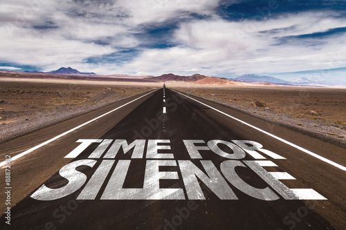 Time for Silence written on desert road
