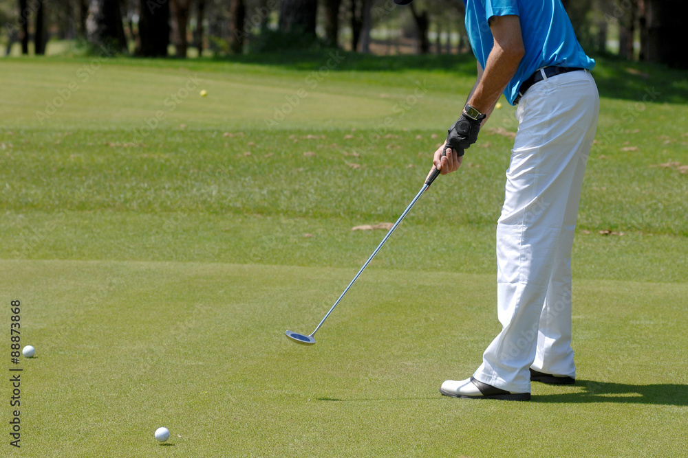 Fototapeta premium Golf ball behind driver at driving range