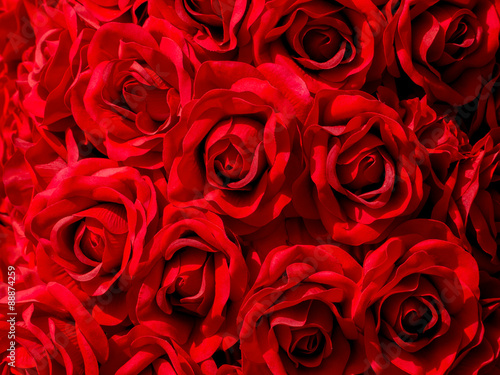 artificial red roses texture background