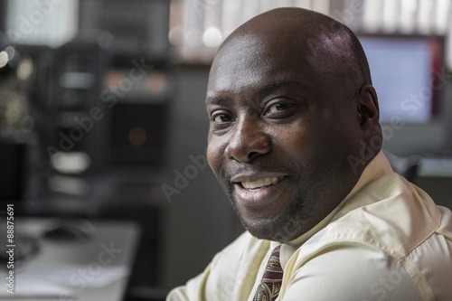 Portrait of an African American male smiling in the office