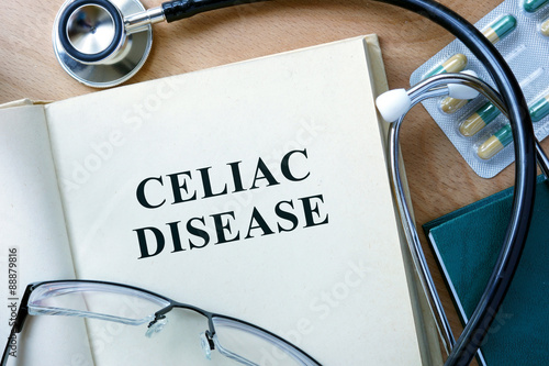 Photography Celiac Disease concept. Book with stethoscope and pills.