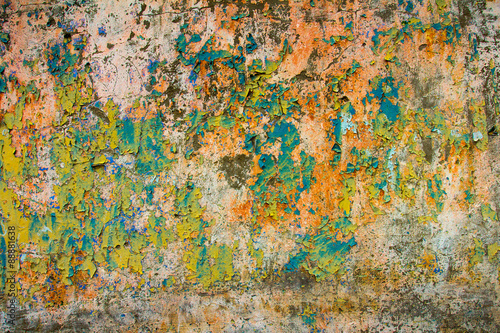Texture of grunge wall surface.Colorful peeling paint on the wall