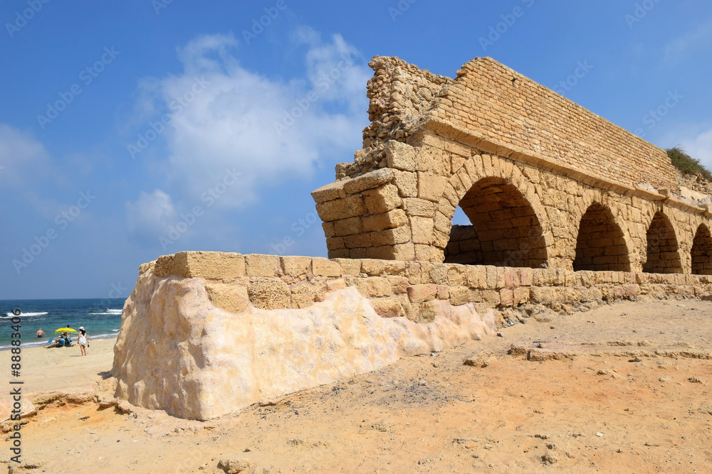 remains of ancient roman aqueduct at Ceasarea along the coast of the Mediterranean Sea, Israel