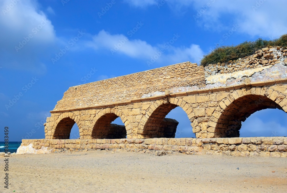 remains of ancient roman aqueduct at Ceasarea along the coast of the Mediterranean Sea, Israel