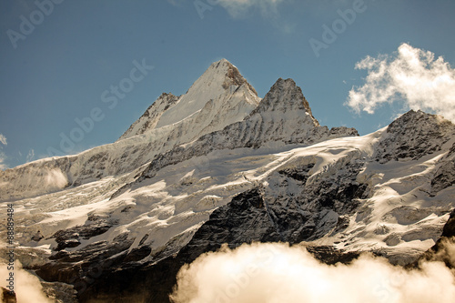 Clouds, ice and snow caps on Eiger,near Grindelwald, Switzerland photo