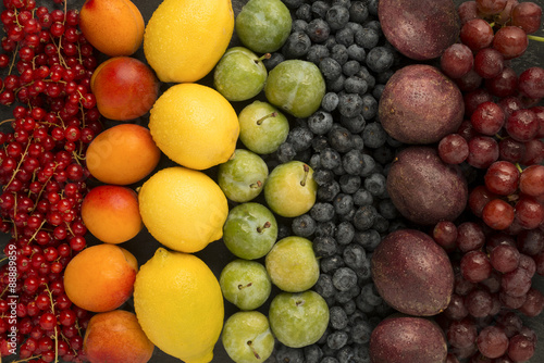 Mixed fruits arranged in rainbow colours