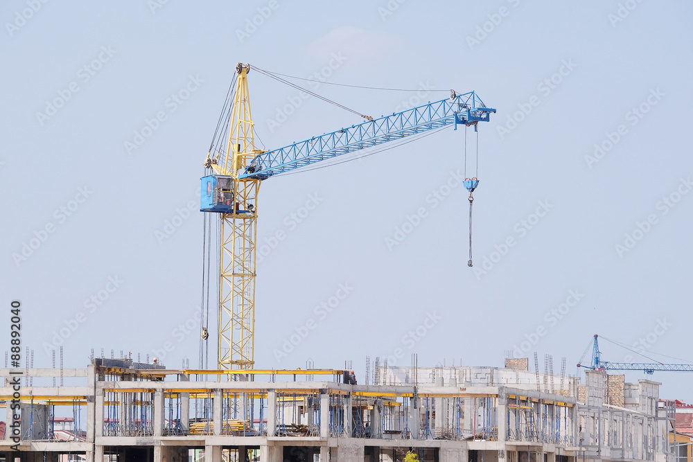 the image of a tower crane the image of a tower crane