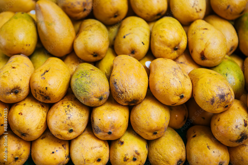 Sweet ripe mangoes in the market Sweet ripe mangoes in the market