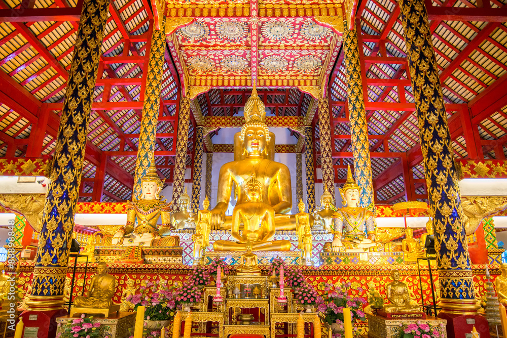 golden buddha statue in suan dok temple