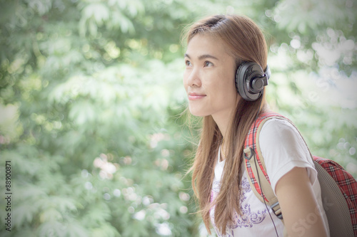 Young beautiful girl listening to music.