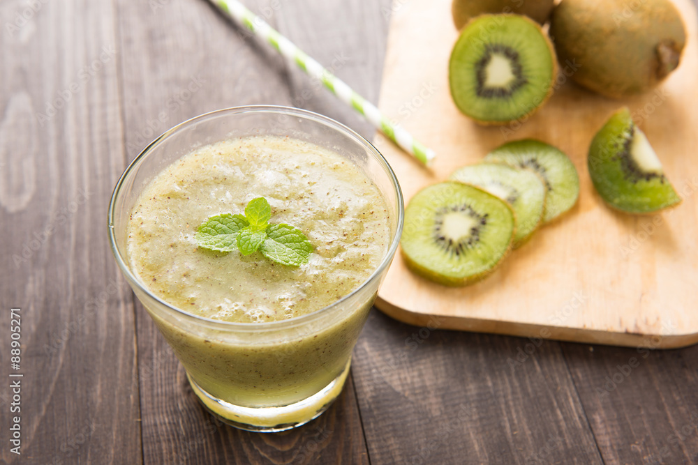 kiwi smoothie with fresh fruits on wooden table kiwi smoothie with fresh fruits on wooden table