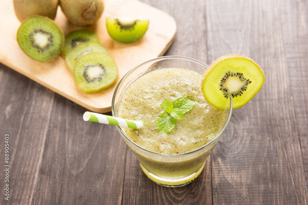 kiwi smoothie with fresh fruits on wooden table kiwi smoothie with fresh fruits on wooden table