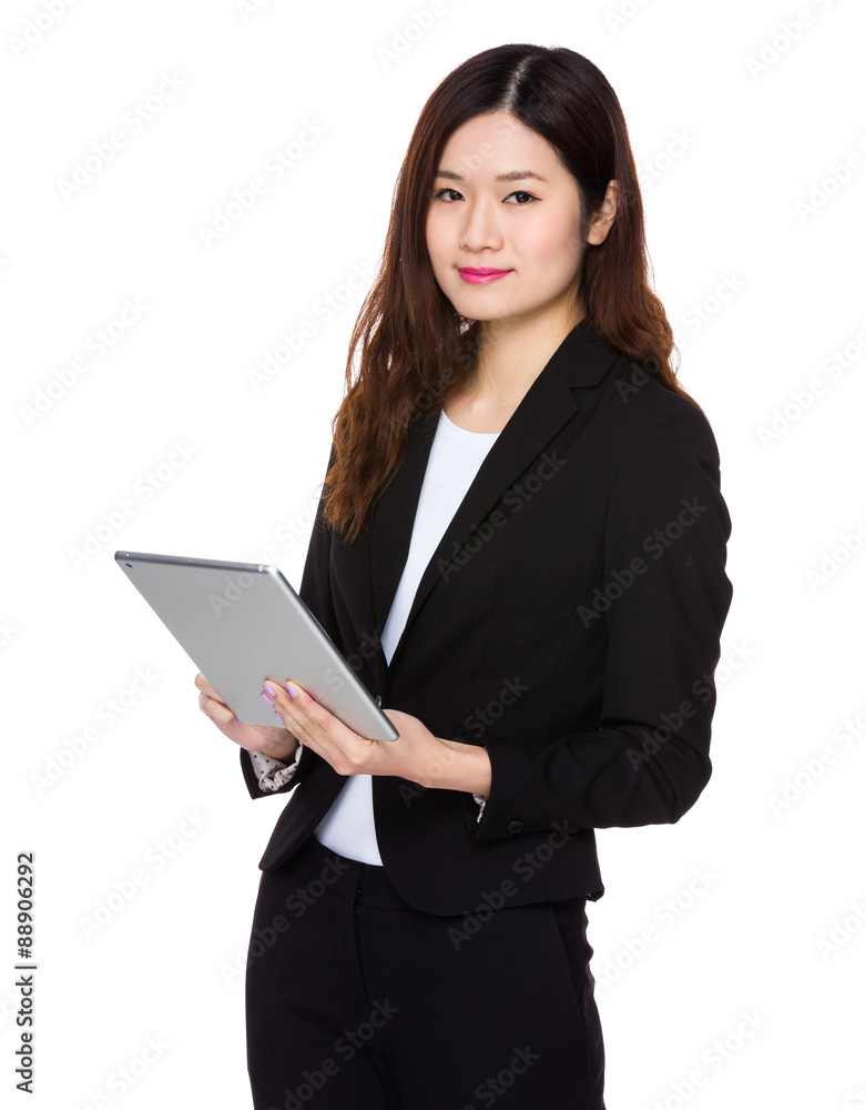 Businesswoman use of the tablet pc Businesswoman use of the tablet pc