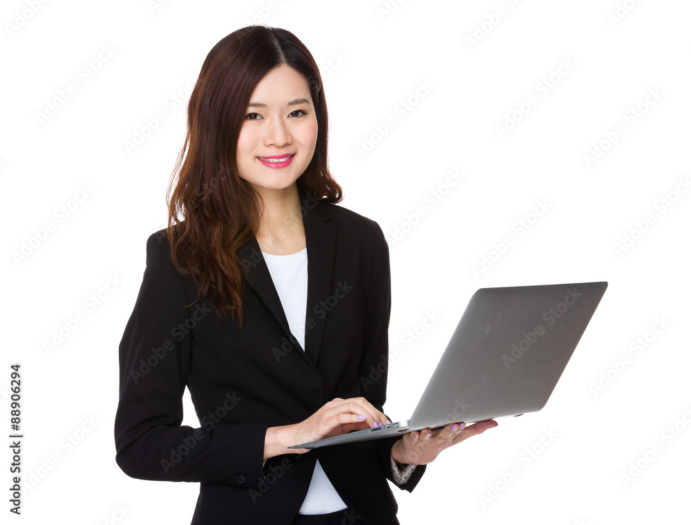Young businesswoman use of the notebook computer Young businesswoman use of the notebook computer