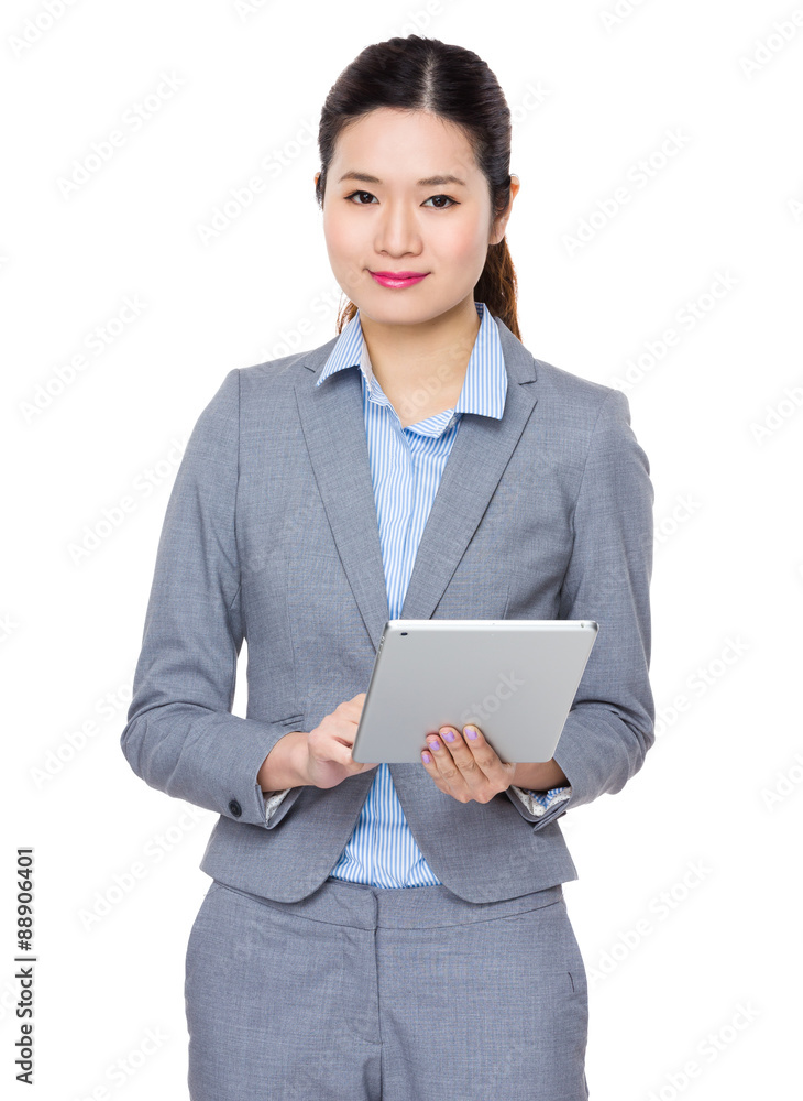 Businesswoman use of the tablet pc Businesswoman use of the tablet pc