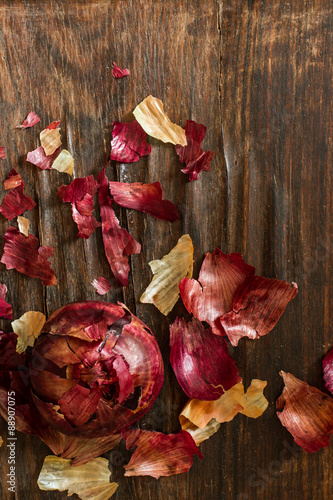 old red onions on a wooden background