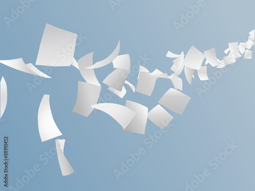 white papers flying on blu sky.