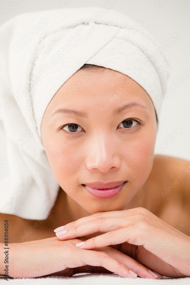 Attractive woman lying on the massage table Attractive woman lying on the massage table