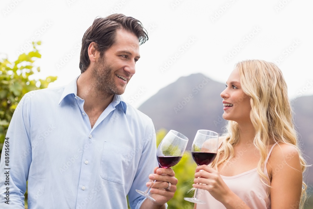 Young happy couple smiling at each other Young happy couple smiling at each other