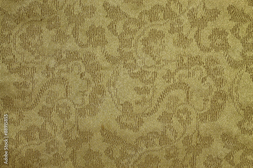 Konstfotografi gold background with a floral pattern material closeup