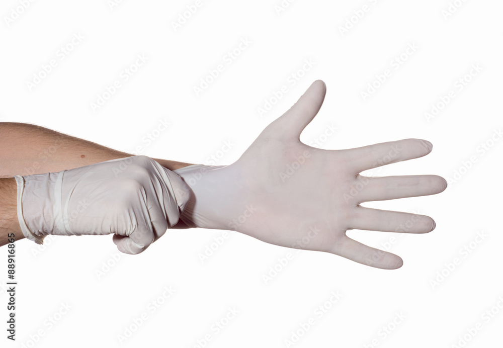 Doctor dress gloves on hands to protection and care for patients Doctor dress gloves on hands to protection and care for patients